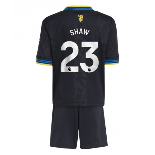 Stroje piłkarskie Manchester United Luke Shaw #23 Koszulka Trzeciej dla dzieci 2025-26 Krótki Rękaw (+ szorty)